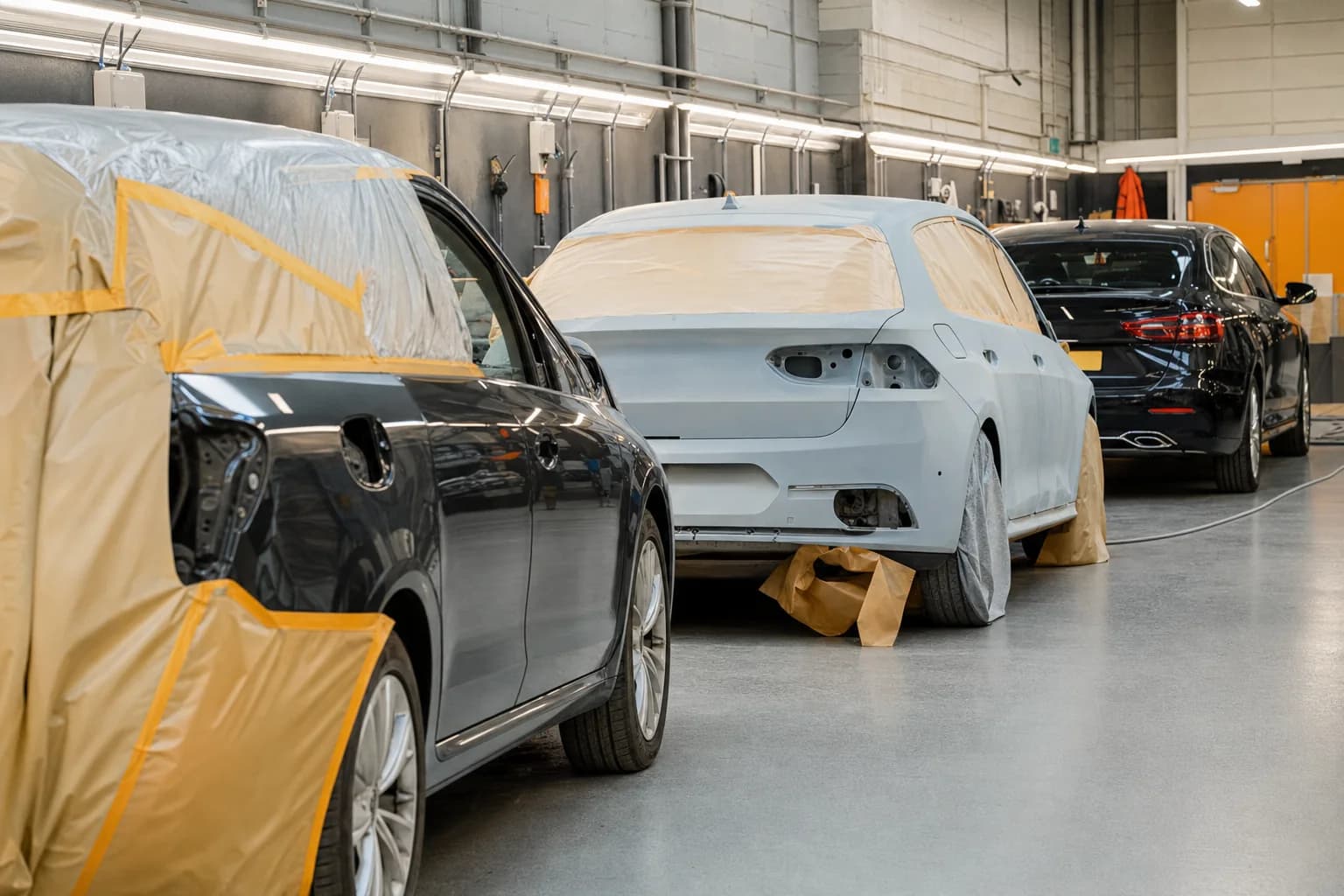 Car body repair workshop with repair bays at Elite Auto Bodies Sheffield